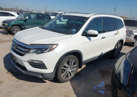 2016 Honda Pilot Touring z USA, uszkodzony, nr VIN 5FNYF5H92GB051447